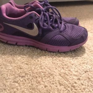 Purple Nike sneakers worn a lot
